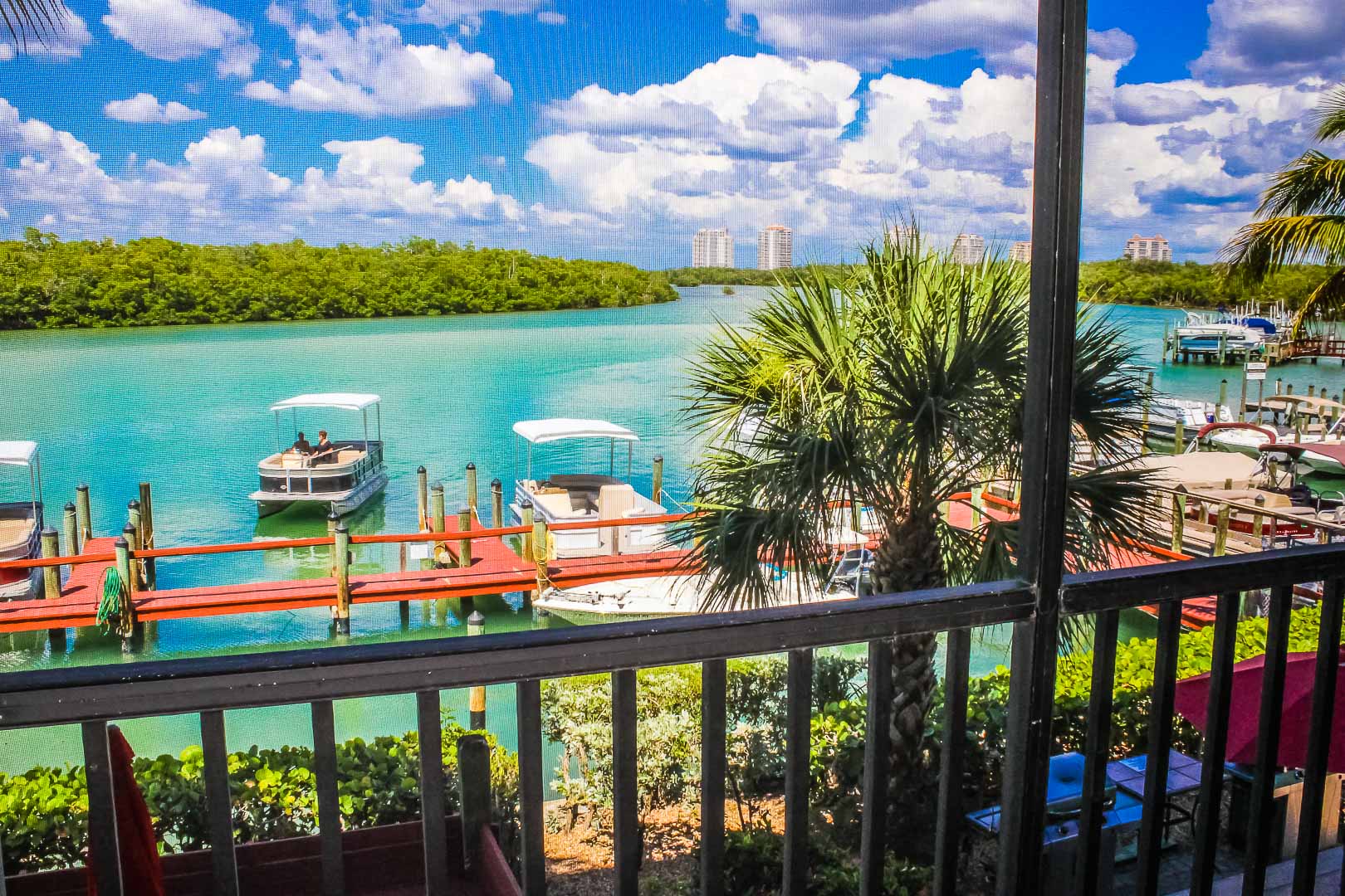 A vibrant beach view from the balcony at VRI's Bonita Resort and Club in Florida.